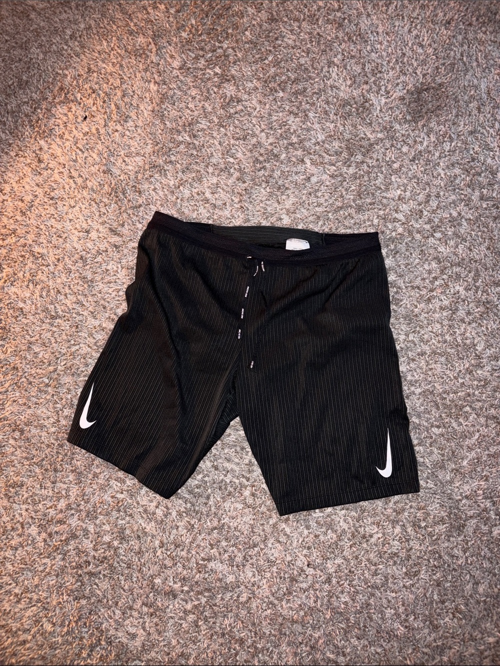 Nike Men’s Black Athletic Shorts with White Swoosh Accents racing tights
